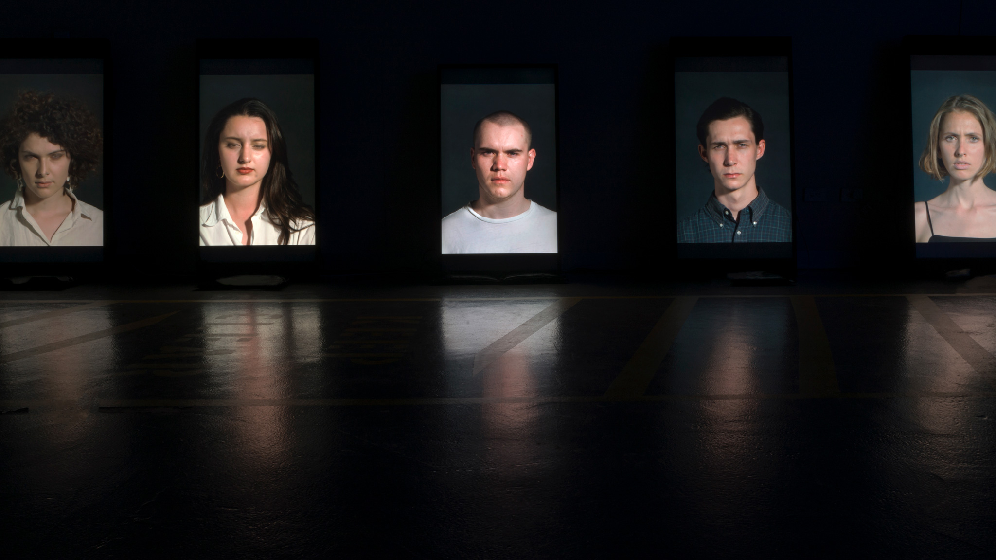 <p><i>Flash Portraits</i>, 2018, 5 Channel Installation, Vertically Orientated LCD Screens, 1200mm x 700mm, Installation View, U.T.S Studios 2018</p>