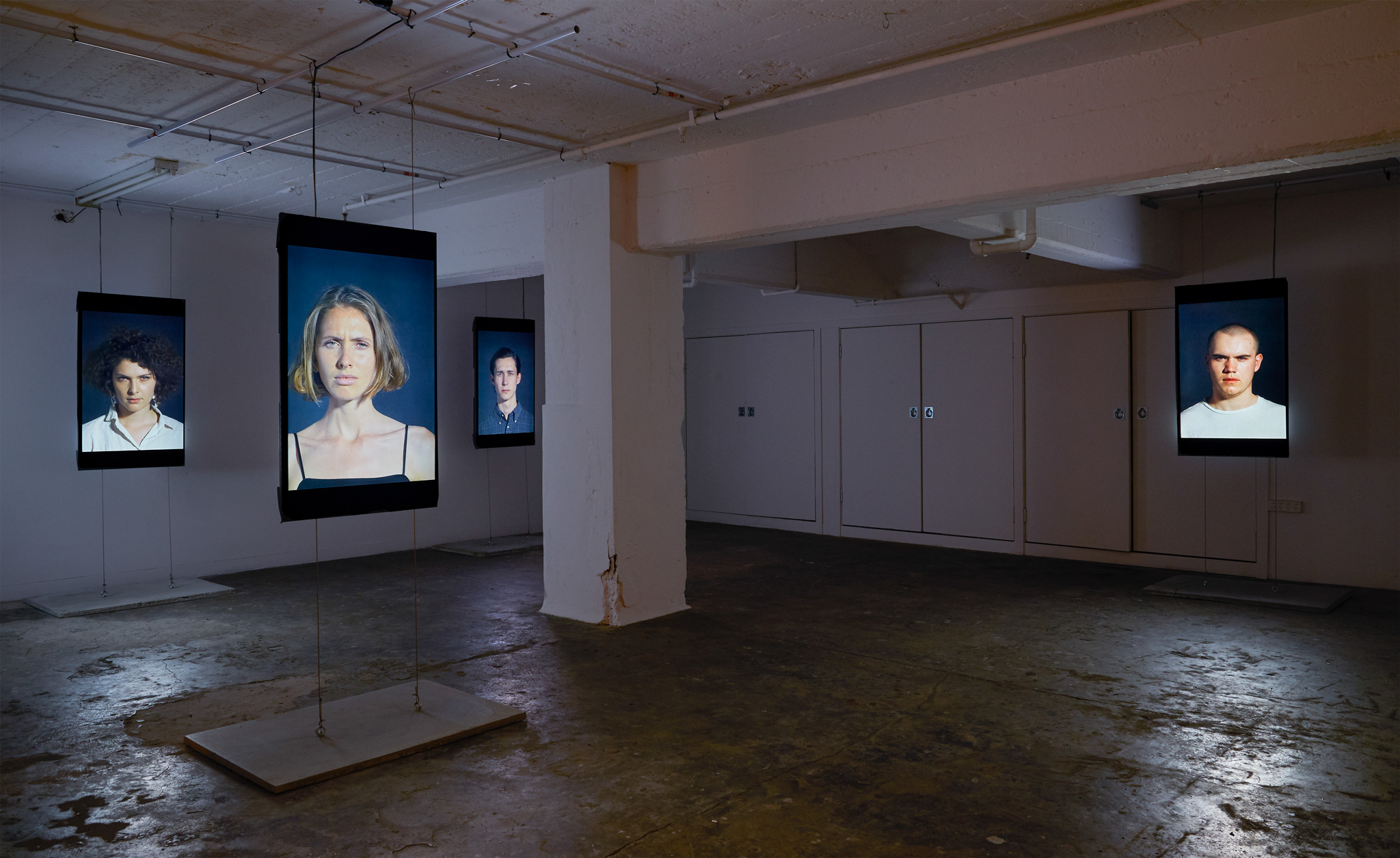 <p><i>Flash Portraits</i>, 2018, 5 channel installation, vertically orientated LCD screens, 1200 x 700mm, Installation View, DownUnder Gallery 2018</p>